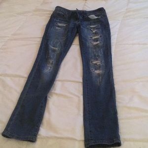 Grunge styled ripped jeans